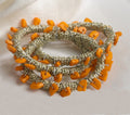 Fennco Styles Hand Beaded Napkin Ring, Set of 4, 3 Colors (Marigold)