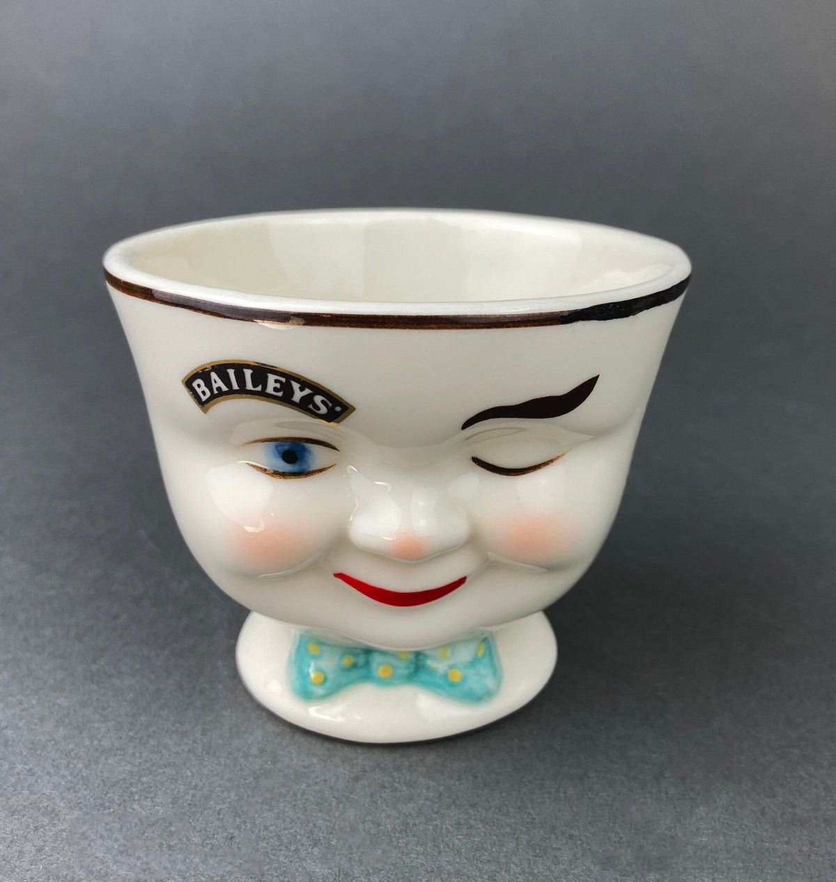 Bailey's Winking Face Creamer with Blue Bow