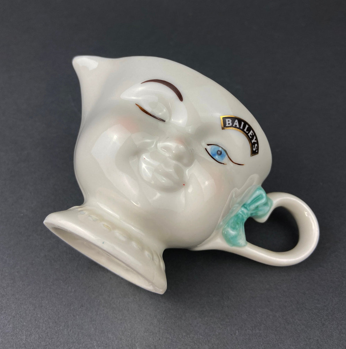 Bailey's Winking Face Creamer with Blue Bow