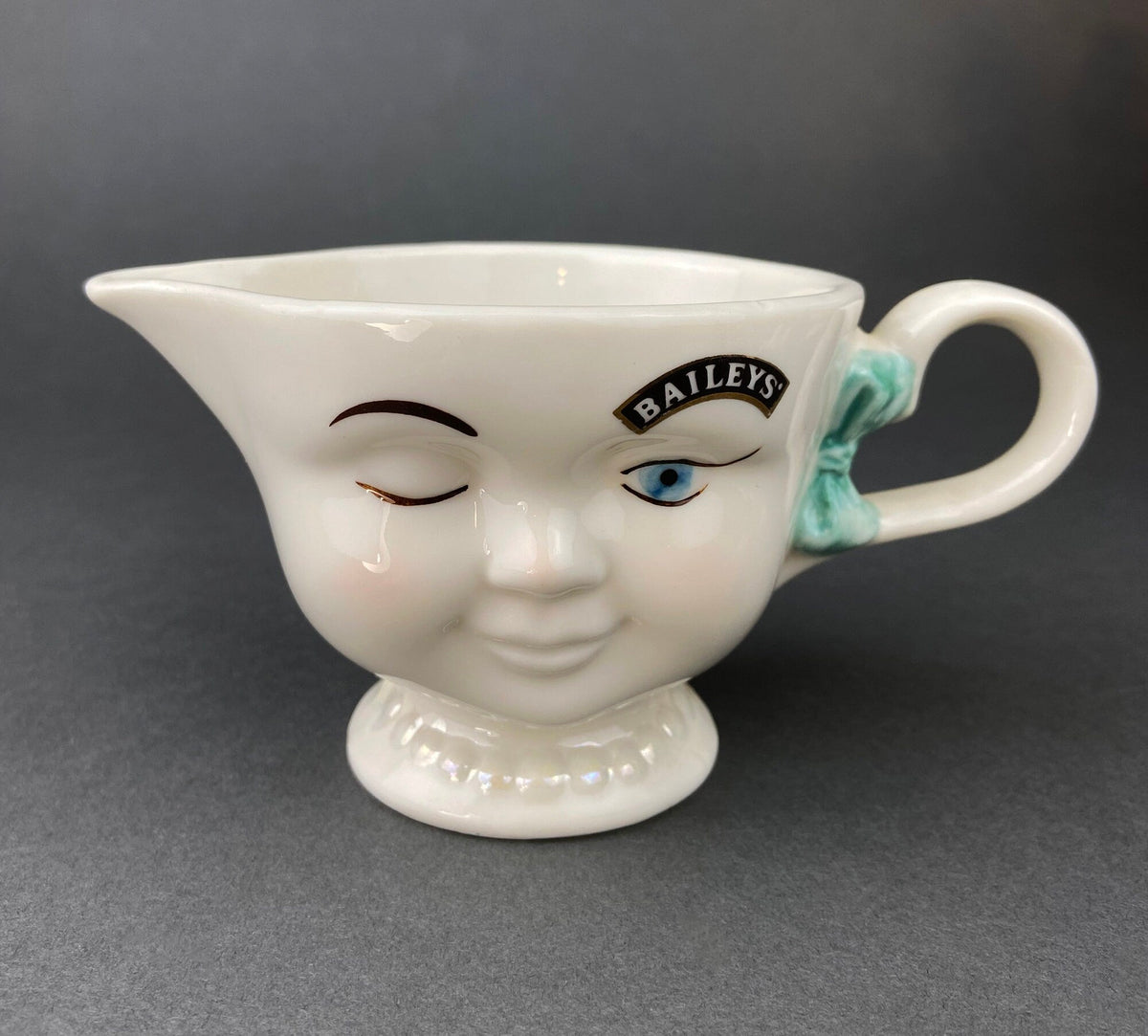 Bailey's Winking Face Creamer with Blue Bow