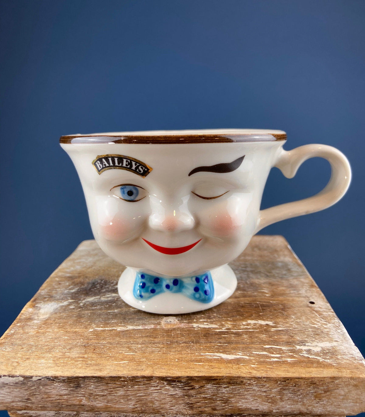 Bailey's Winking Face Creamer with Blue Bow