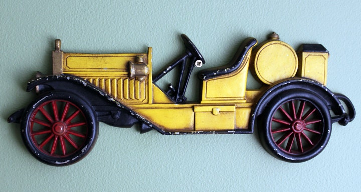 Sexton Cast Metal Yellow Car Wall Hanging