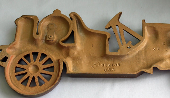 Sexton Cast Metal Yellow Car Wall Hanging